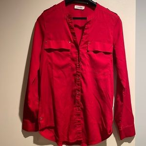 Red long sleeve shirt with slender gold button details